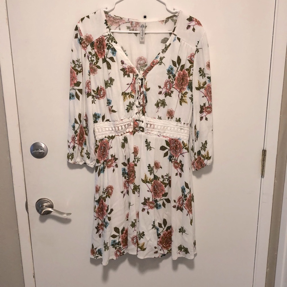 American Rag brand. Worn once, white base with floral design. Size large.